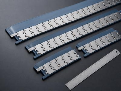 Custom belt fastener production